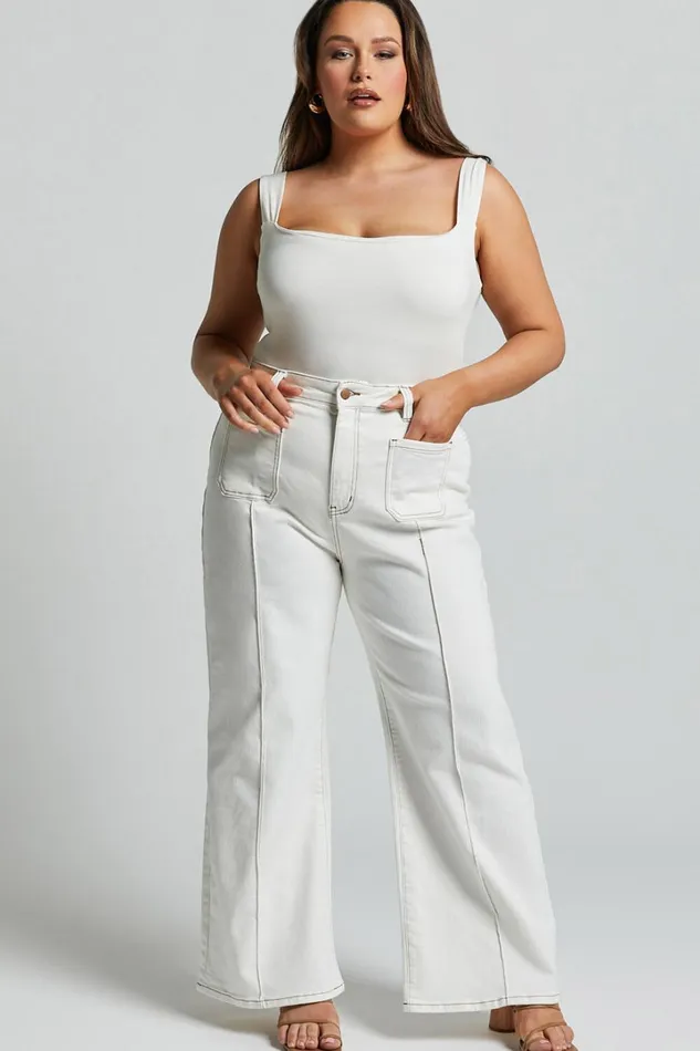 Malcolm Jeans 8211 Mid Rise Contrast Stitch Flared Denim Jeans In White Denim Women Showpo Denim