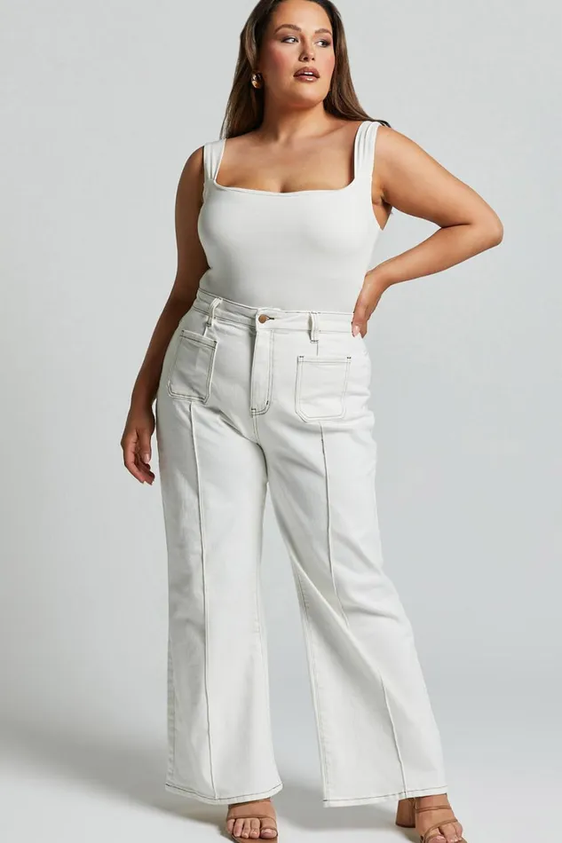 Malcolm Jeans 8211 Mid Rise Contrast Stitch Flared Denim Jeans In White Denim Women Showpo Denim