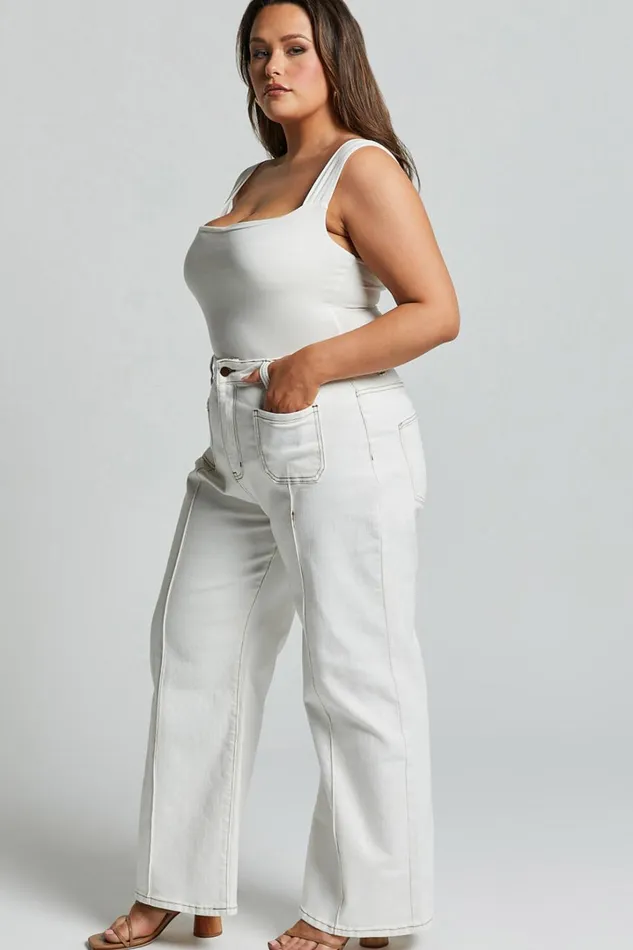 Malcolm Jeans 8211 Mid Rise Contrast Stitch Flared Denim Jeans In White Denim Women Showpo Denim