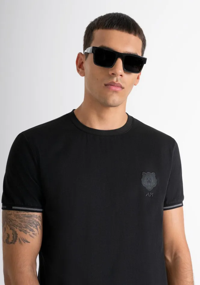 TShirts And Polo Men Antony Morato Slim Fit TShirt In Black Cotton Jersey With Rubberised Tiger Logo Black