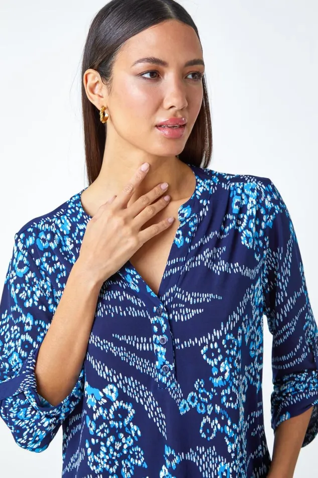 Women Blue Textured Animal Print VNeck Stretch Shirt Roman Tops