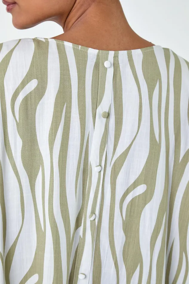 Women Ivory Animal Button Back Batwing Top Roman Tops
