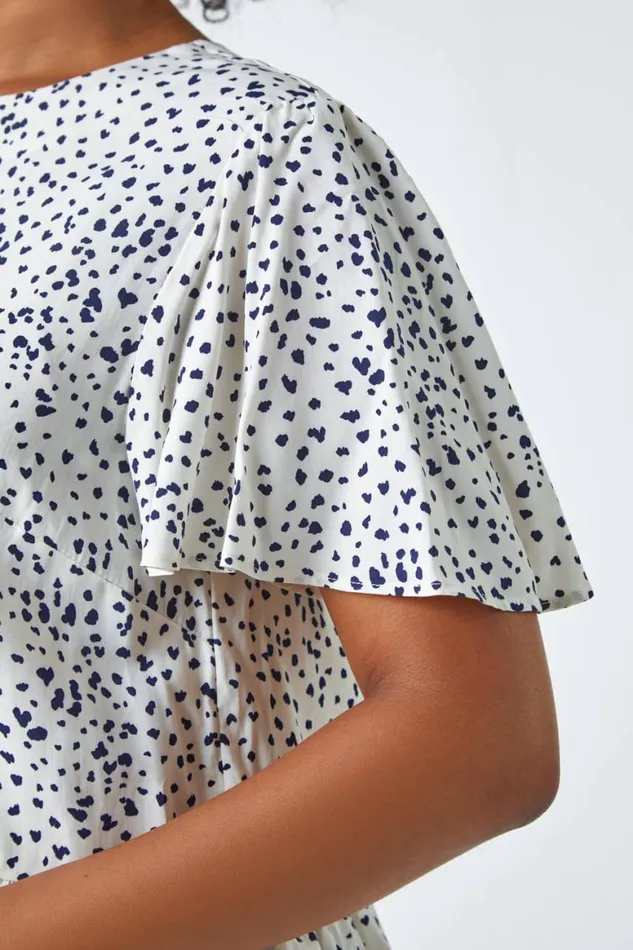 Women Navy Ditsy Spot Print Peplum Top Roman Tops